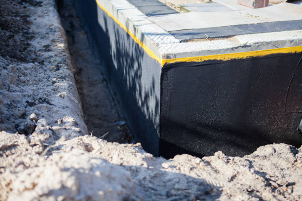 Professional Waterproofing technician working in Cosby, TN